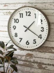 ROUND BLACK AND WHITE WALL CLOCK