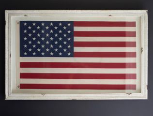 LARGE FRAMED AMERICAN FLAG UNDER GLASS