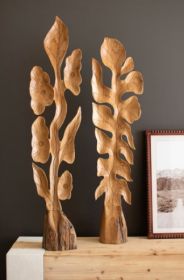 SET OF TWO BOTANICAL TEAK SCULPTURES ABOVE