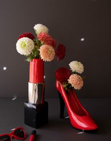 SET OF TWO CERAMIC LIPSTICK AND HIGH HEEL VASES