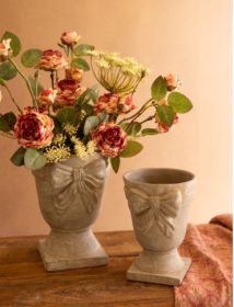 SET OF TWO CONCRETE URNS WITH BOW DETAIL (MIN 2)