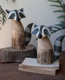 SET OF TWO RECYCLED WOOD AND IRON RACCOONS