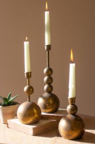 SET OF THREE ANTIQUE BRASS TAPER CANDLE HOLDERS