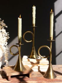 SET OF THREE ANTIQUE BRASS TRUMPET TAPER CANDLE HOLDERS