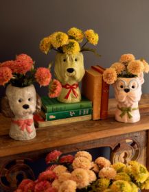 SET OF THREE CERAMIC DOG VASES WITH BOWS