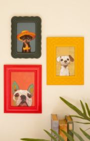 SET OF THREE FRAMED DOG PAINTINGS