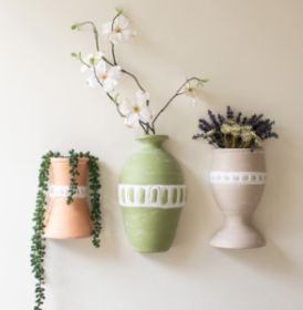 SET OF THREE CLAY WALL VASES